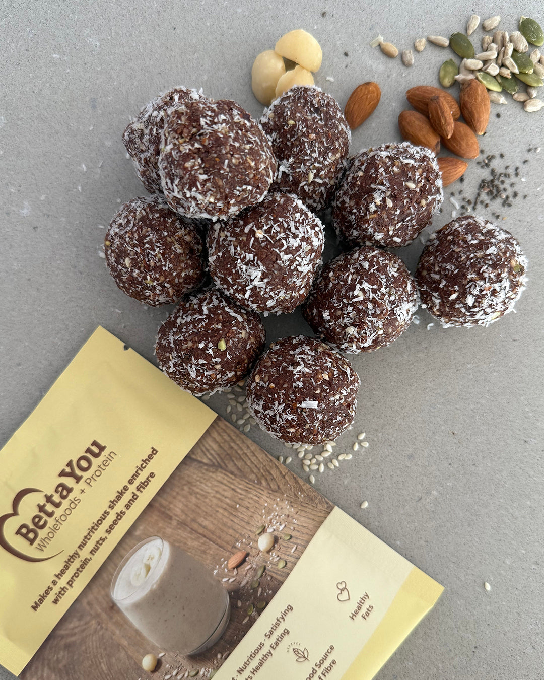 BettaYou chocolate and banana protein balls rolled in coconut