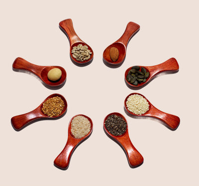 8 nuts and seeds inside BettaYou on spoons